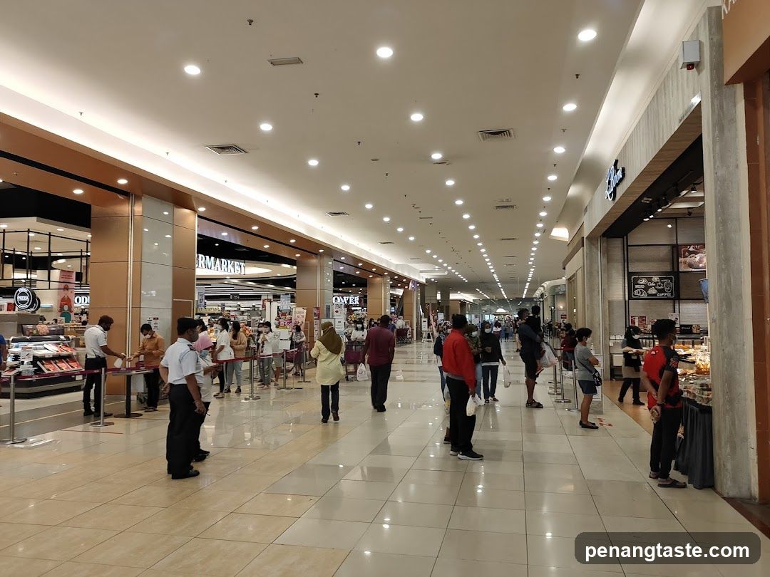 People queuing in a supermarket aisle