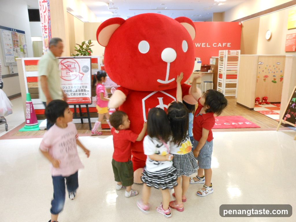 Children interacting with a mascot