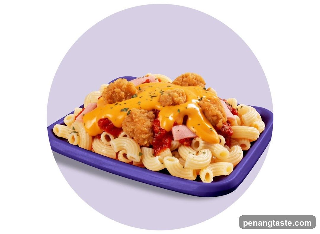 Pasta with Chicken Nuggets and Cheese Sauce
