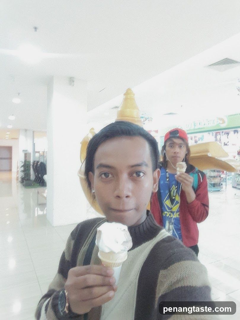 Indoor selfie with ice cream in shopping mall