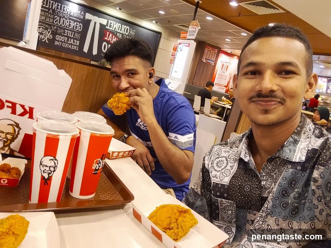 Two men dining at KFC