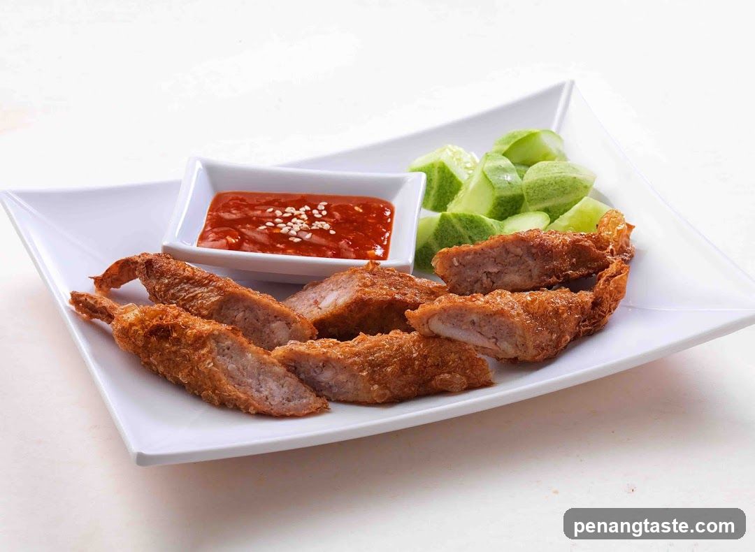 Fried Shrimp Rolls with Dipping Sauce and Cucumber Slices