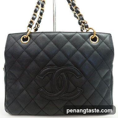 Black quilted leather handbag with gold chain straps