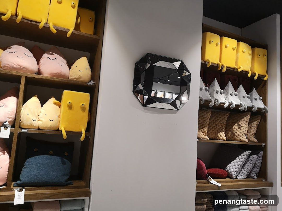 Plush toys and home decor on shelves