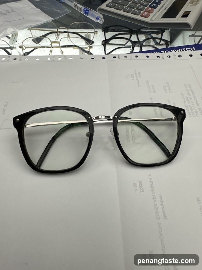 Eyeglasses on paper