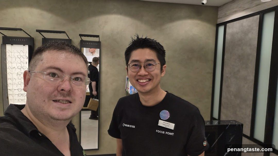 Two men in an optical store