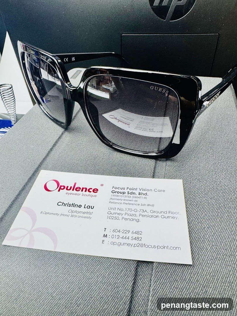 Guess Sunglasses and Business Card
