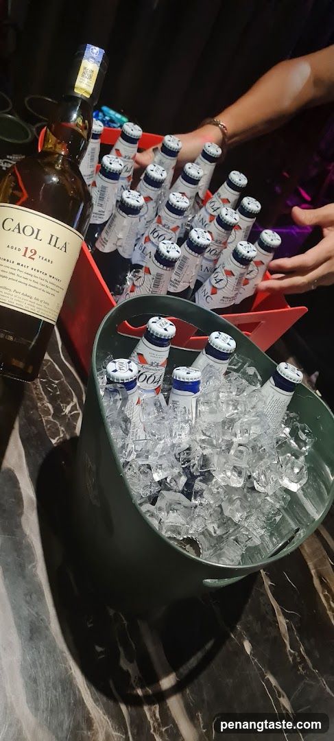Bottles of Beer and Scotch Whisky