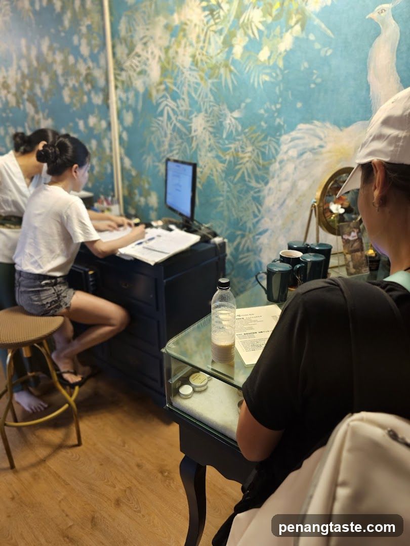 People at a counter with a computer