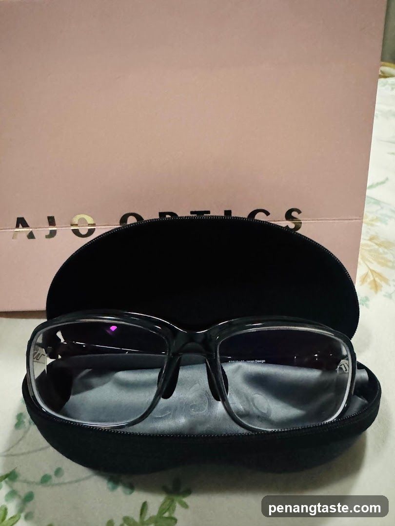 Eyeglasses in case with branded box