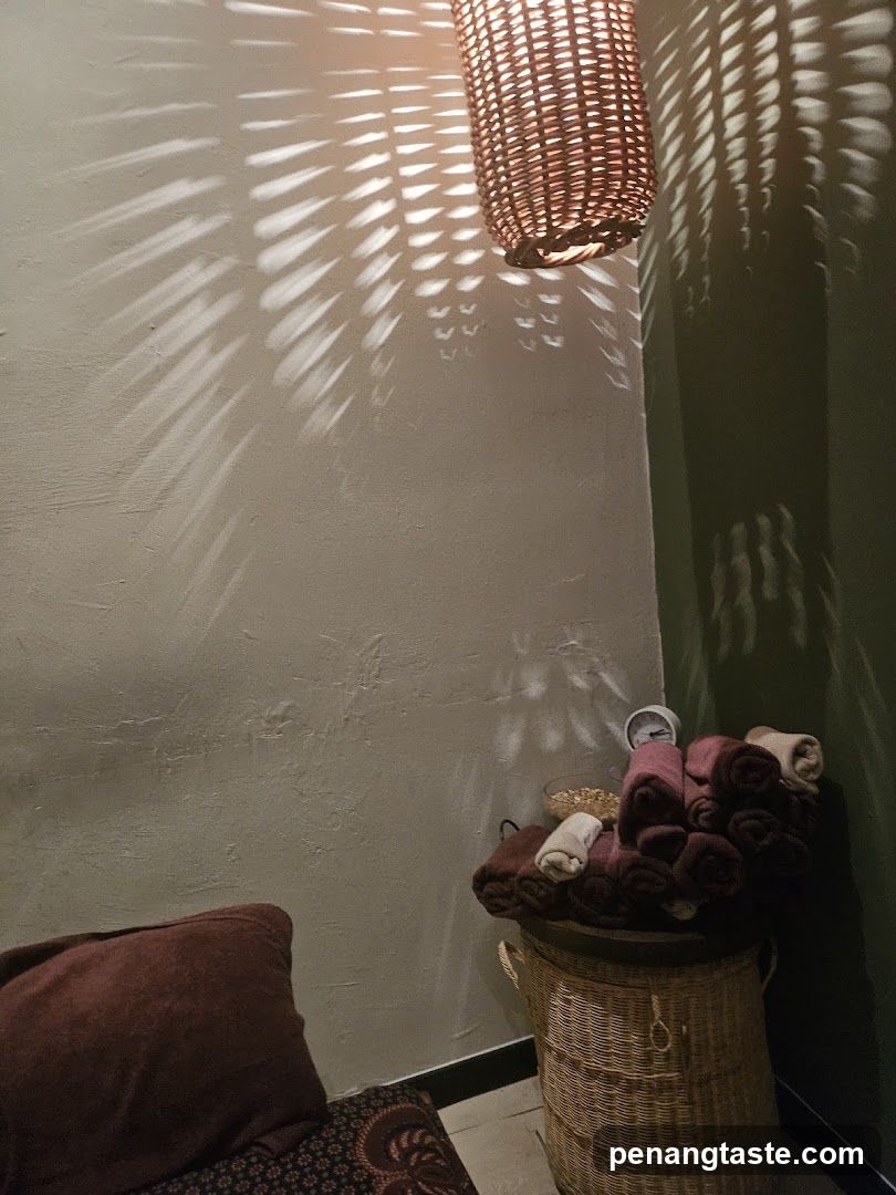 Spa Interior with Woven Lamp and Rolled Towels