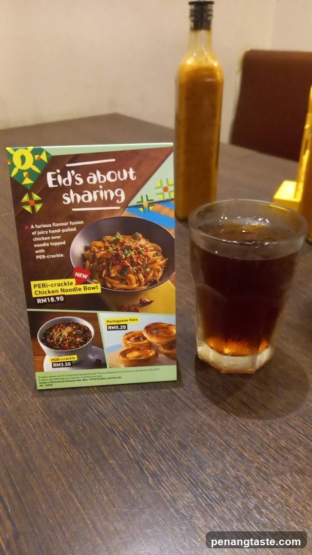 Table setting with beverage and promotional flyer