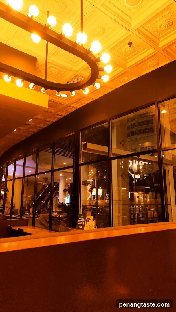 Interior view of a cafe with a large chandelier