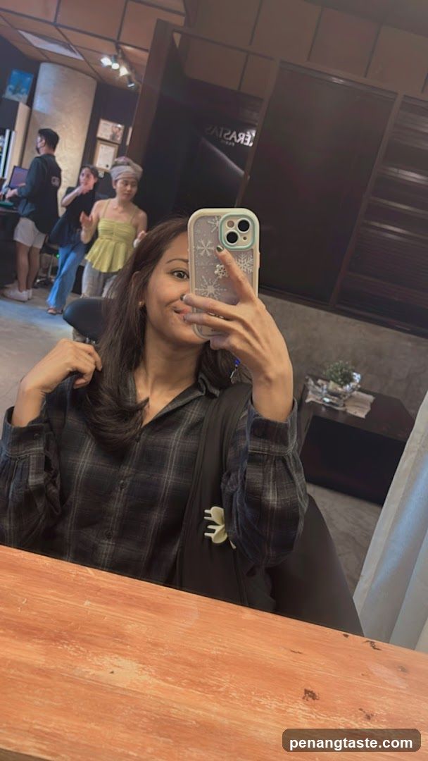 Woman taking a selfie in a salon