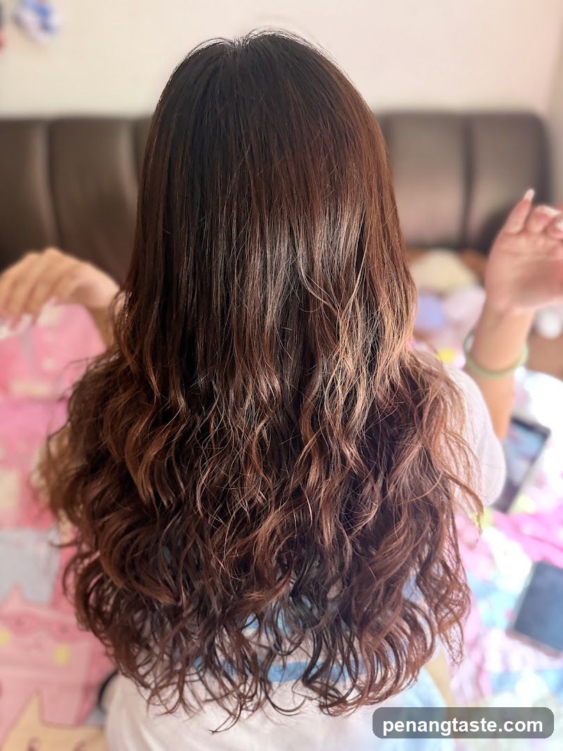 Woman's long wavy brown hair