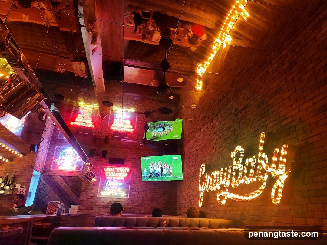 Bar Interior with Neon Signs and TVs