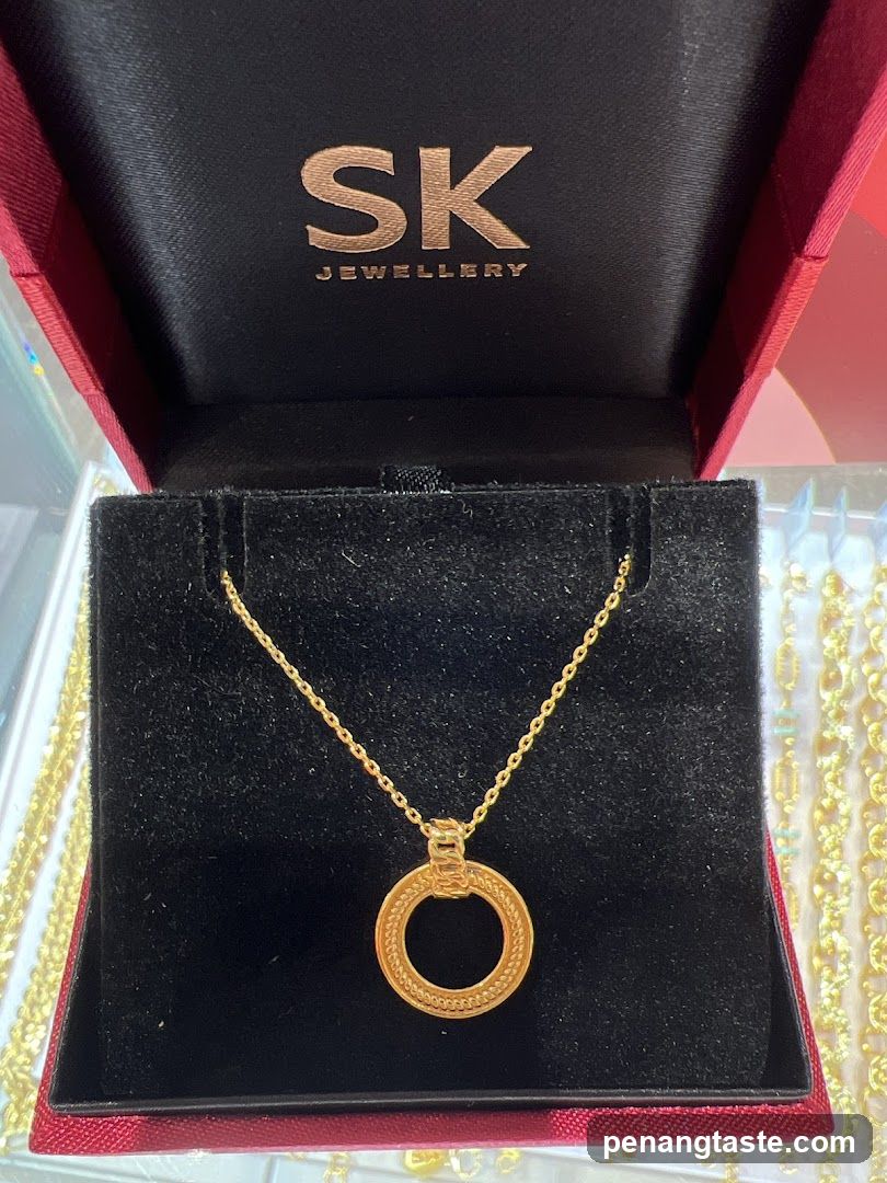 Gold Necklace in Jewelry Box