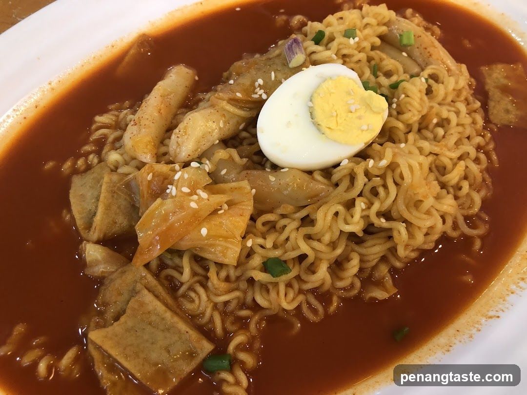 Spicy Noodle Soup with Egg and Fish Cakes