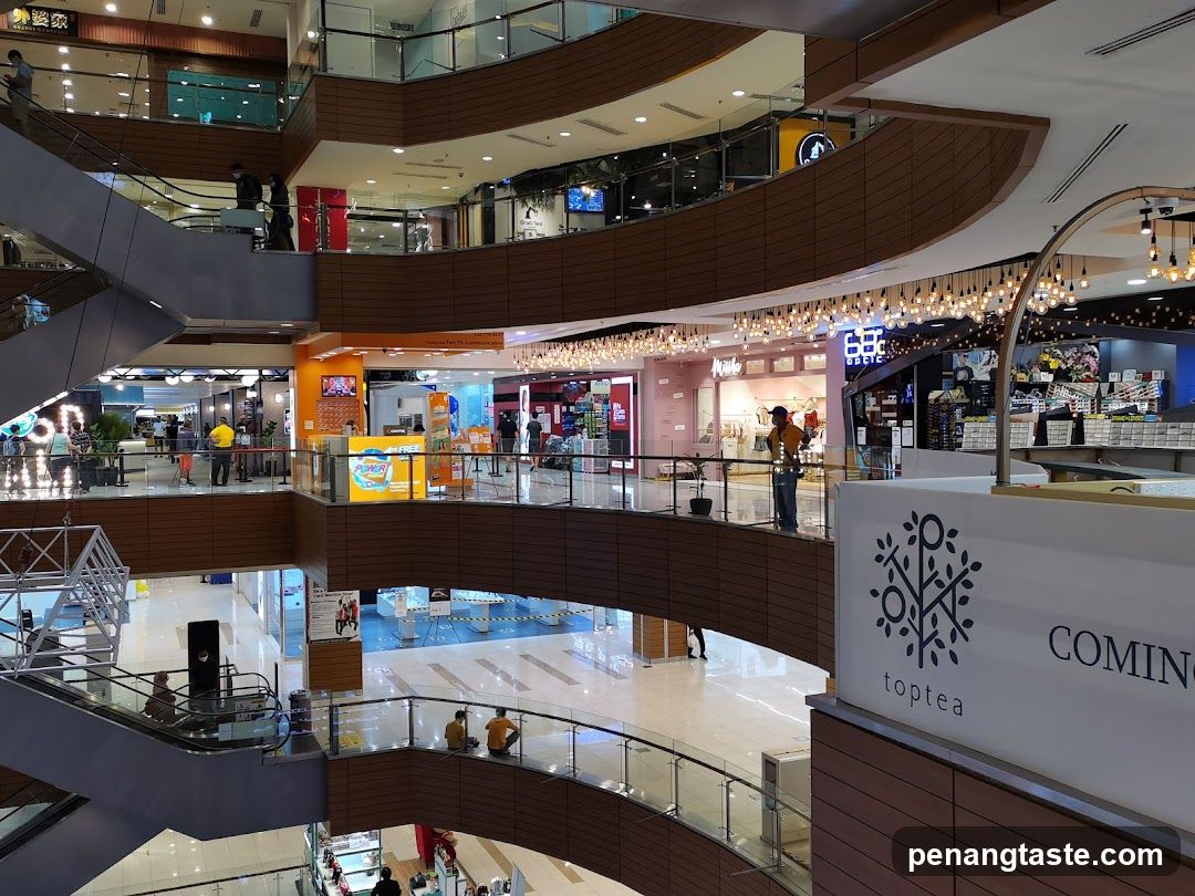 Mall Interior with Shops and Escalators