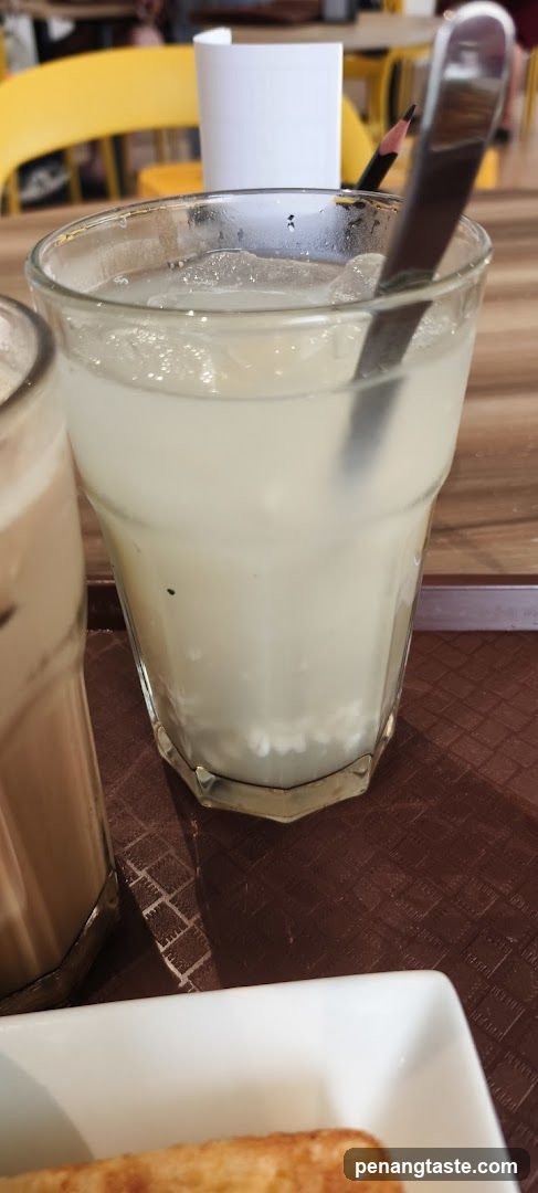 Iced Drink with Spoon and Pencil