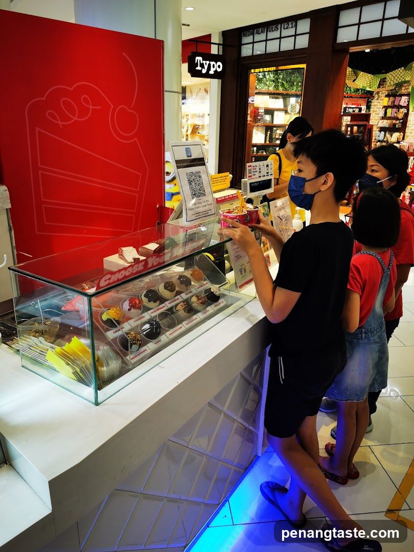 Dessert counter with customers