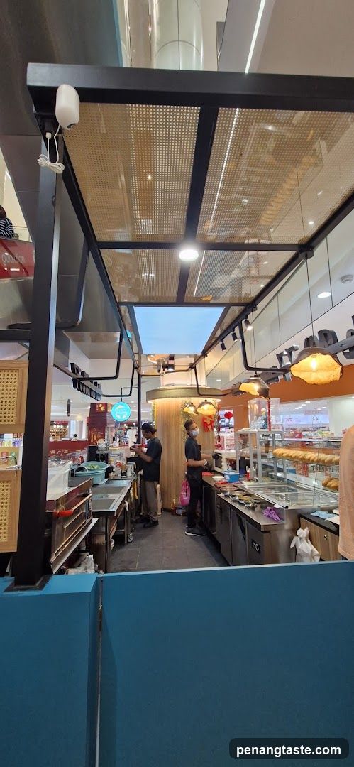 Food stall interior with staff