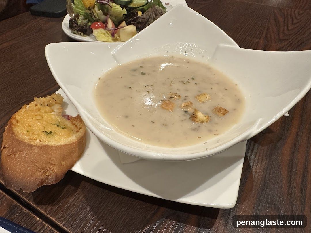 Creamy Soup with Croutons and Garlic Bread