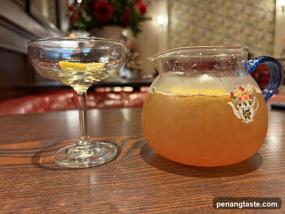 Cocktail and Pitcher of Drink