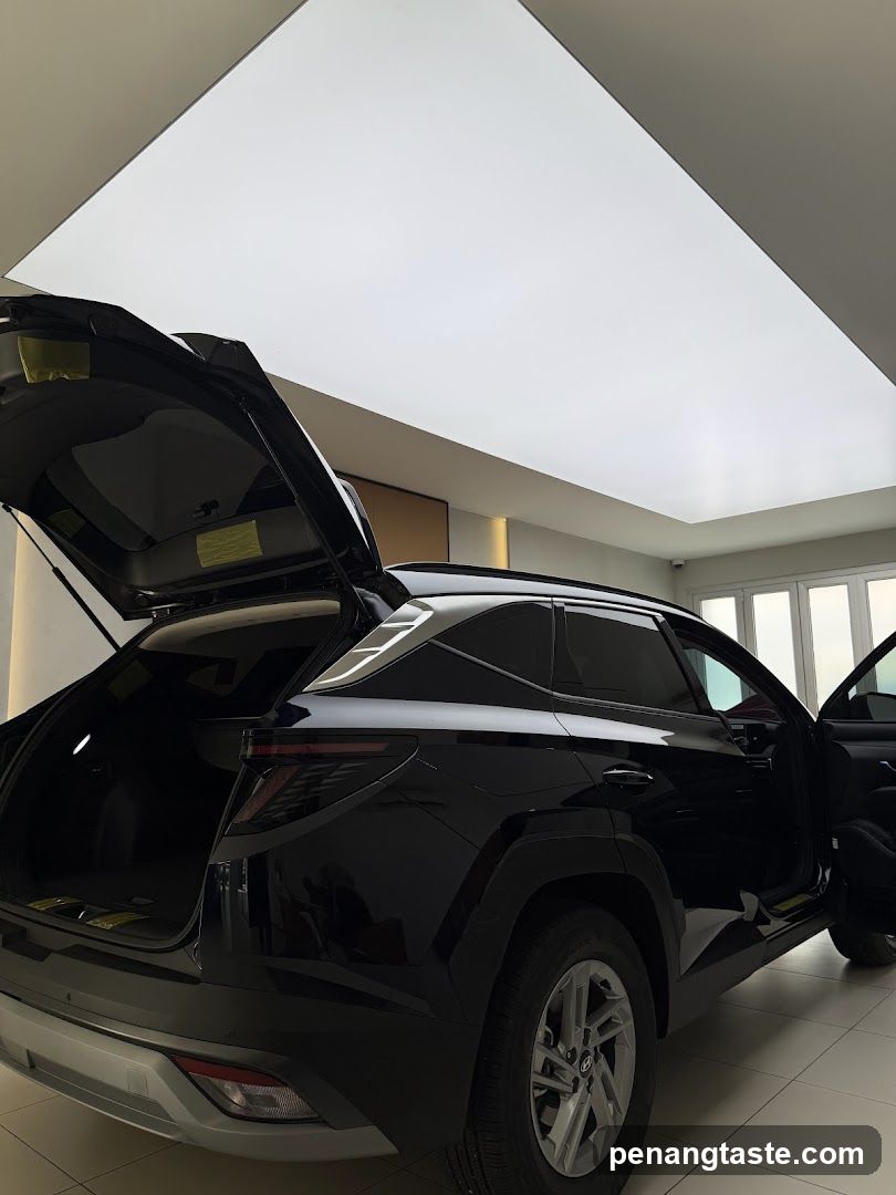 Black SUV with Open Trunk and Doors