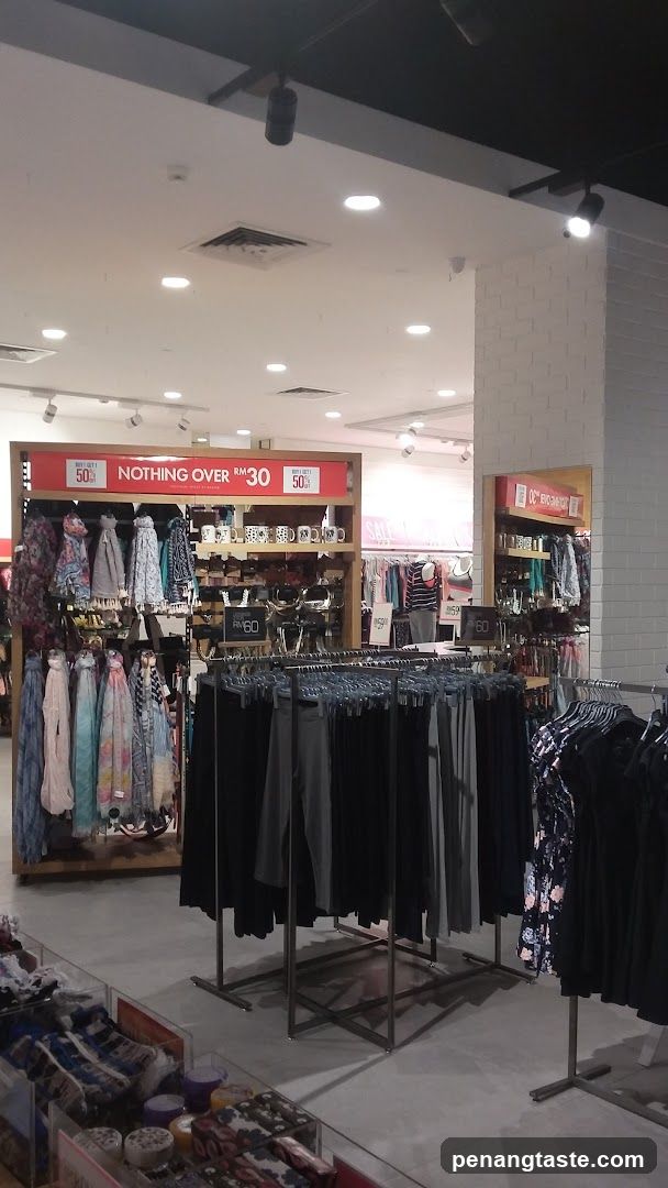 Clothing store interior with sale signs
