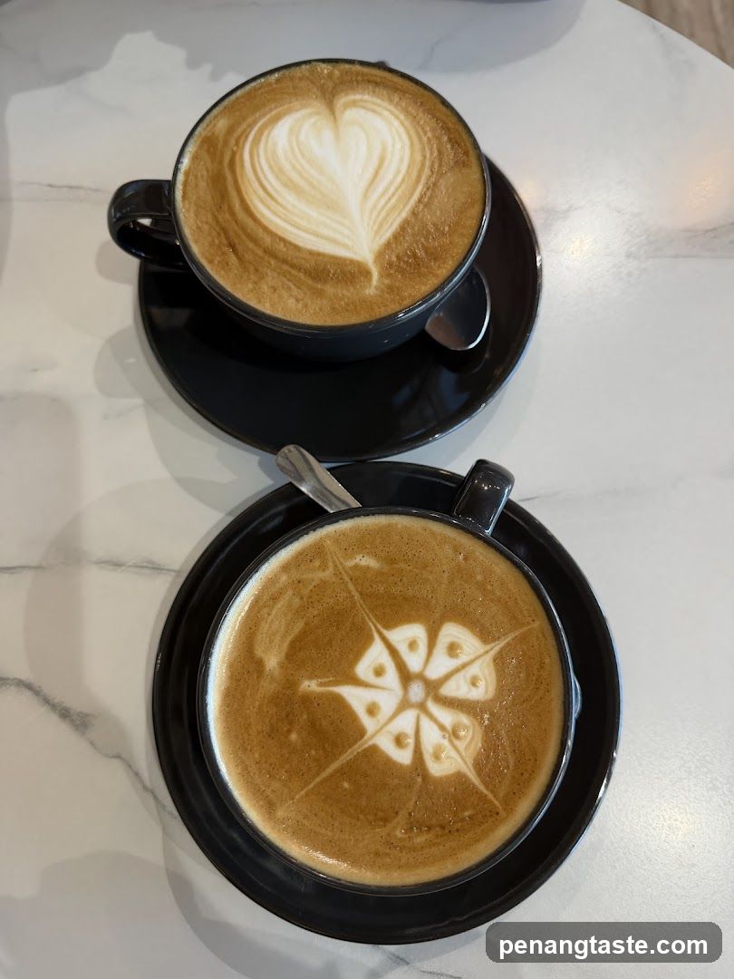 Two coffees with latte art
