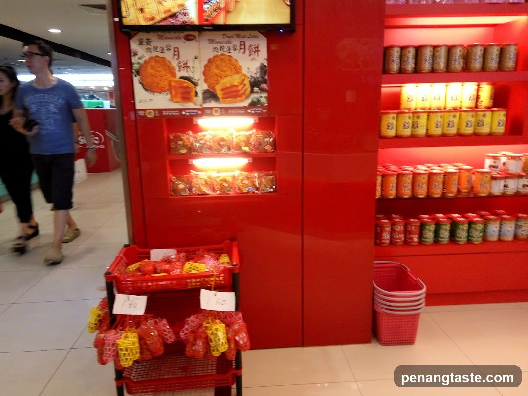 Red Display Shelves with Canned Goods and Mooncakes