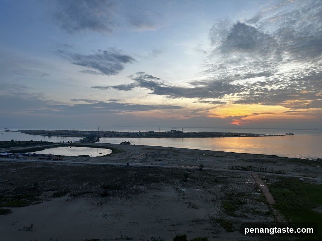 Sunrise over a coastal construction site