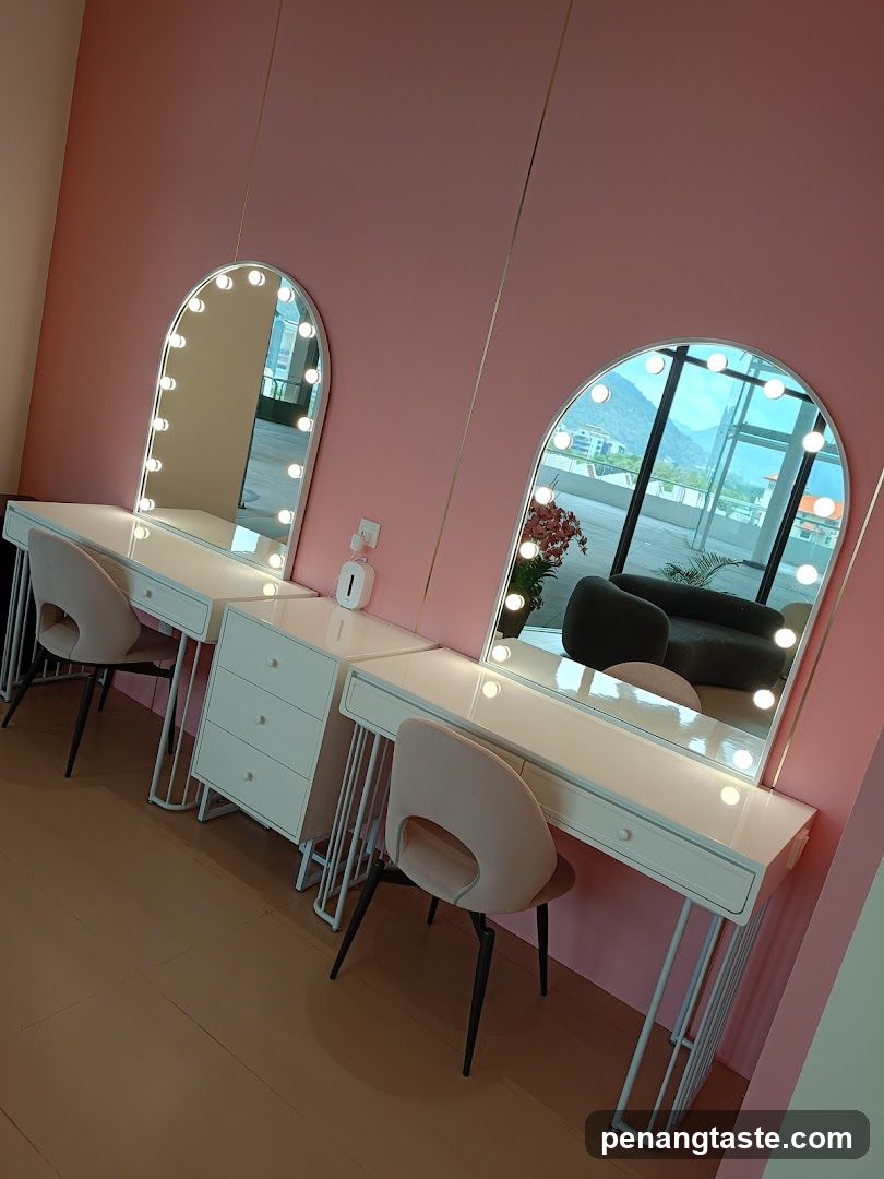Vanity stations with illuminated mirrors