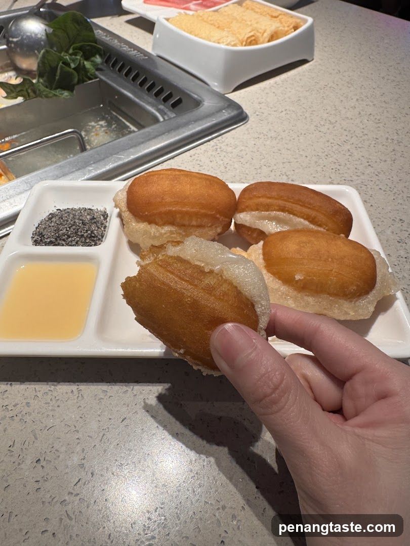 Fried Dough with Sweetened Condensed Milk and Sesame Seeds