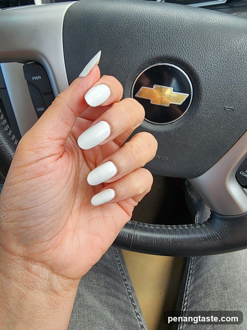 White Nails on Steering Wheel