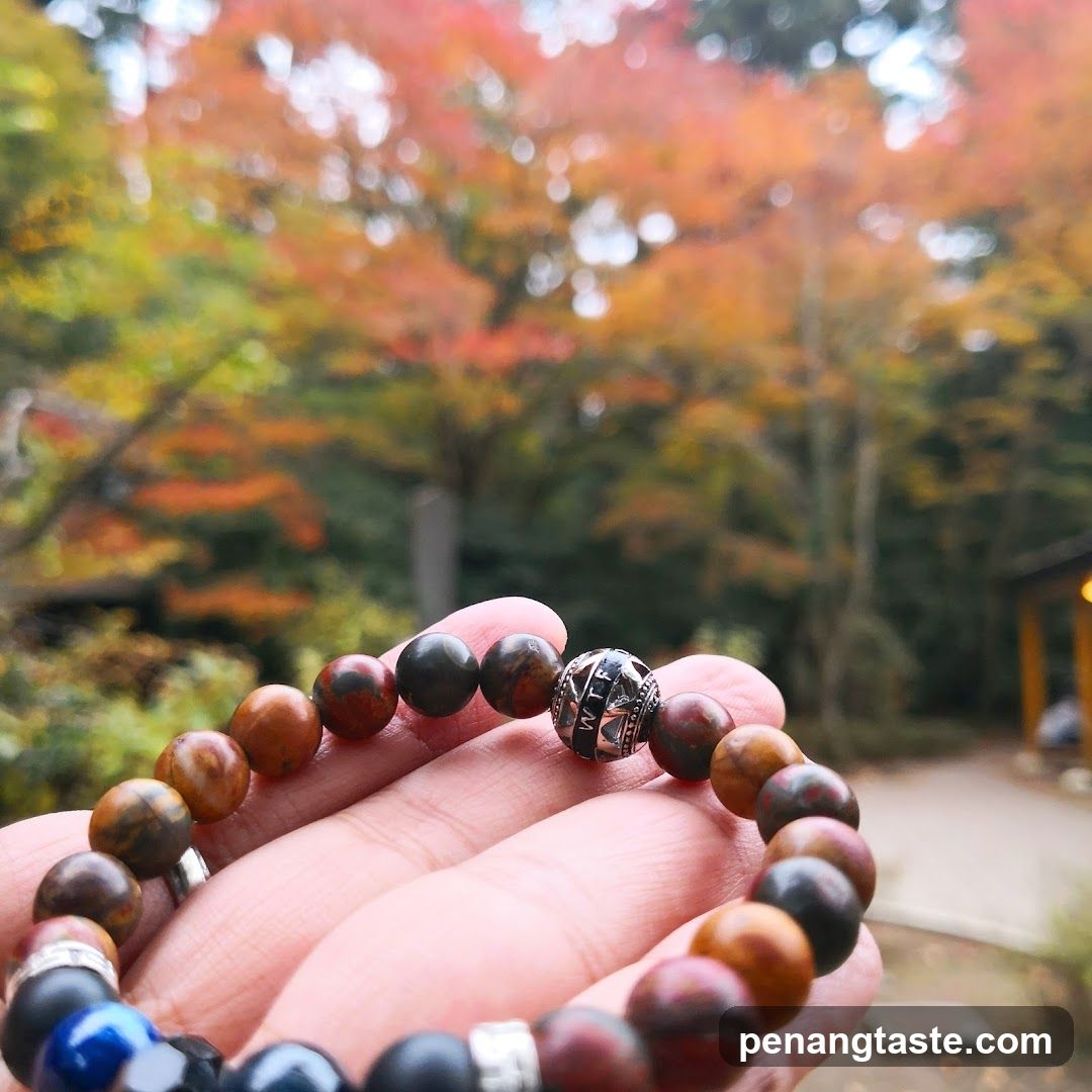 Bracelet with autumn foliage background