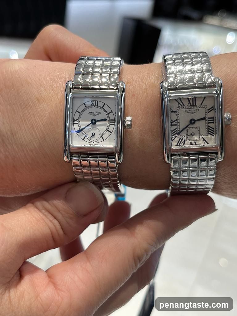 Two Longines watches on wrists