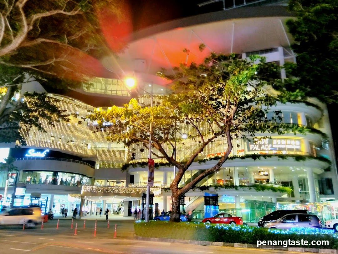 Night view of a brightly lit shopping mall