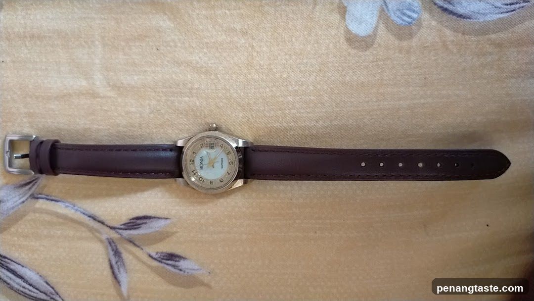 Watch with brown leather strap