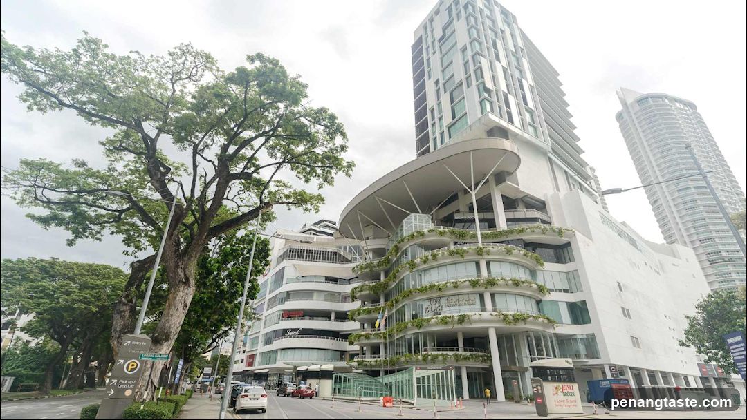 Modern Building Facade with Lush Greenery