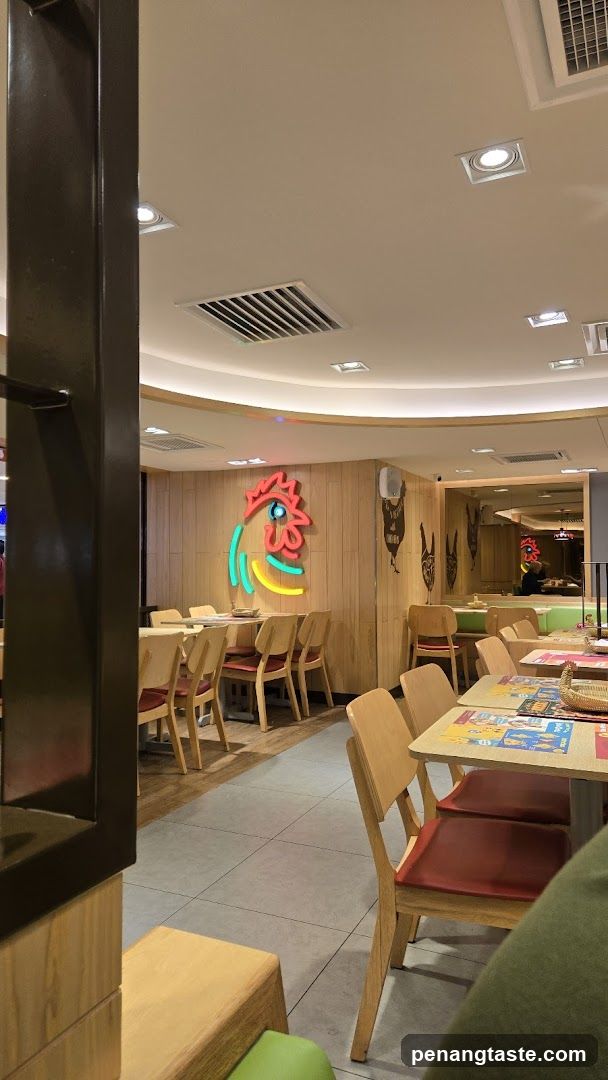 Restaurant Interior with Neon Chicken Sign
