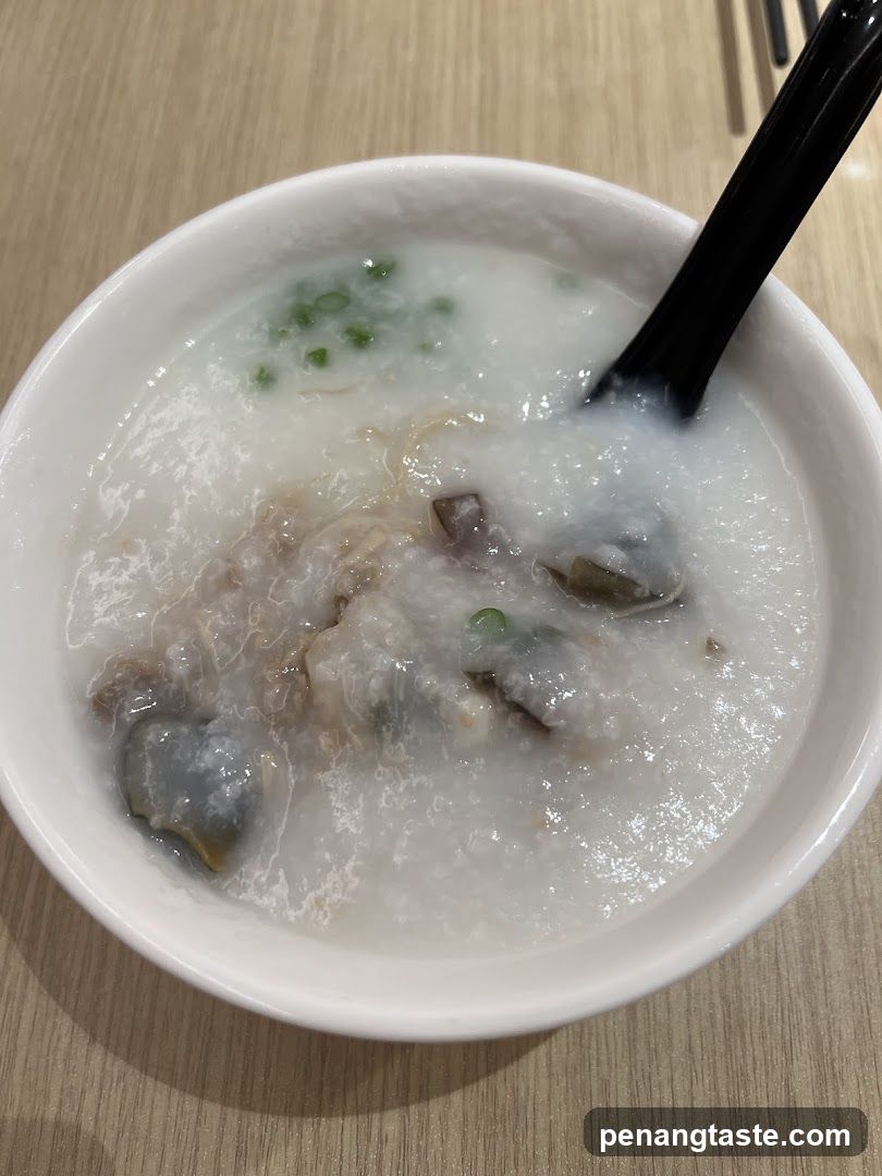 Congee with Preserved Egg and Pork