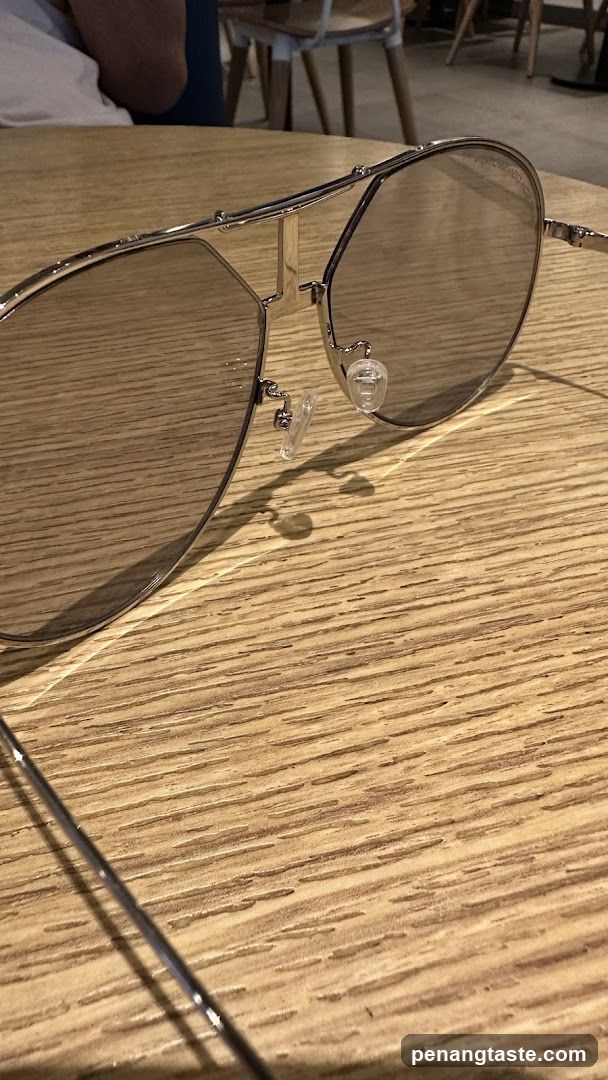 Aviator Sunglasses on Wooden Table