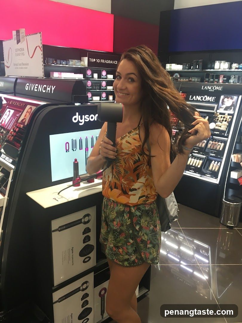 Woman with Hair Dryer in Cosmetics Store