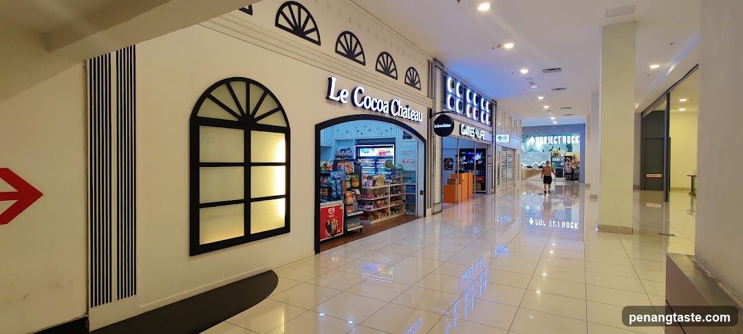 Le Cocoa Chateau and adjacent stores