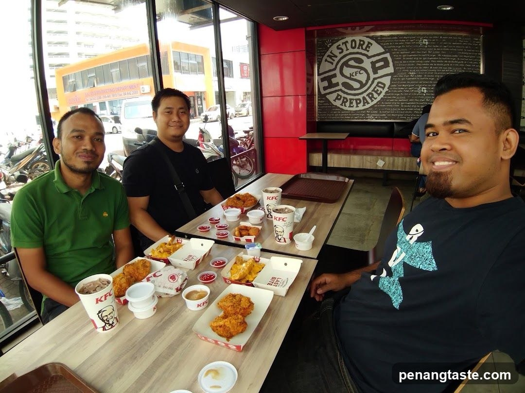 Group dining at KFC restaurant interior
