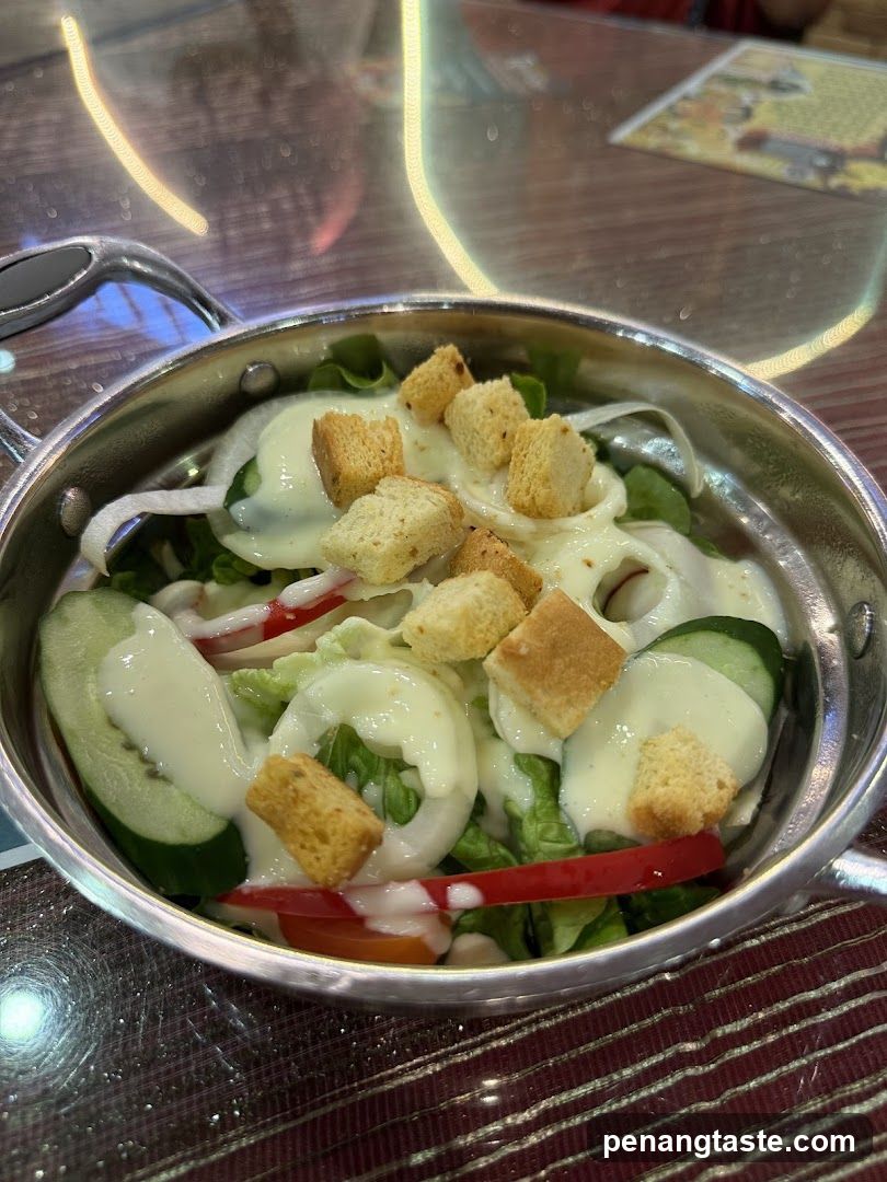 Salad in metal bowl