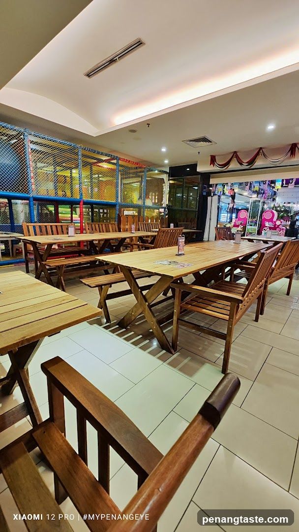 Indoor dining area with children's play zone