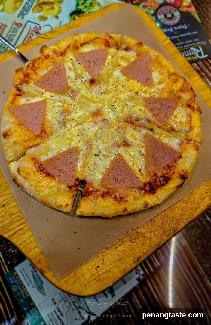 Pizza on wooden board